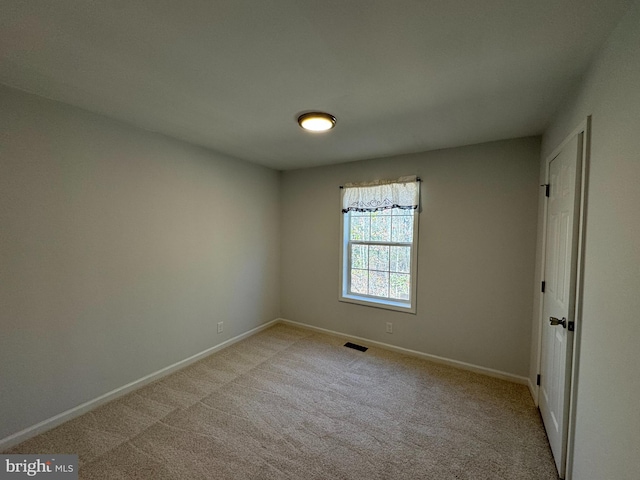 empty room with light carpet