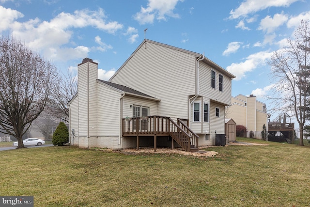 rear view of house with stairs, a yard, cooling unit, and a wooden deck