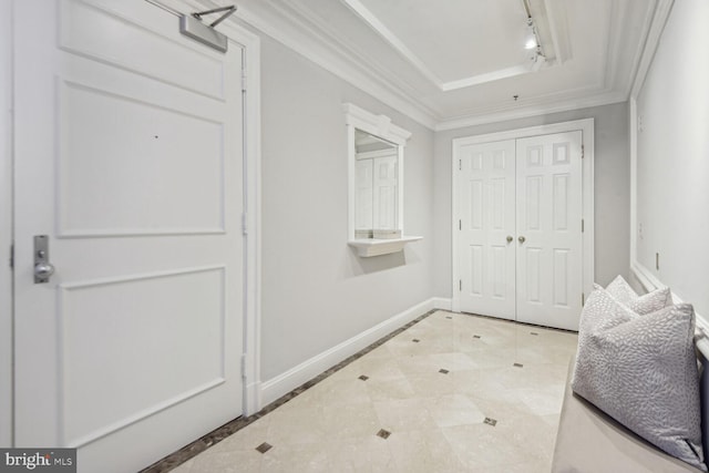 doorway featuring crown molding