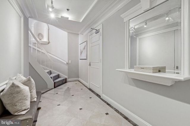 bathroom featuring rail lighting, tile patterned floors, and ornamental molding