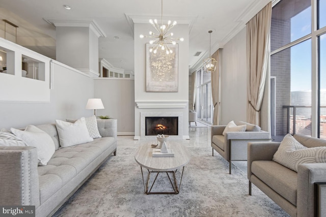 1401 N Oak St Unit 903, 905, Arlington, VA 22209 - living area featuring a chandelier, plenty of natural light, a lit fireplace, and ornamental molding