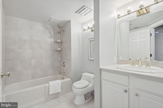 full bathroom with tile patterned flooring, vanity, toilet, and tiled shower / bath