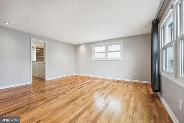 spare room featuring light hardwood / wood-style floors