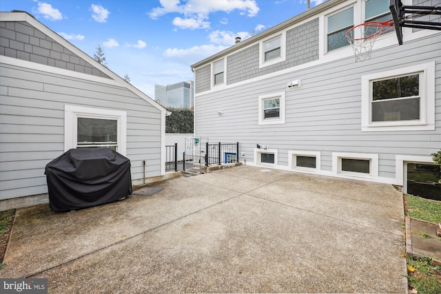 back of house with a patio area