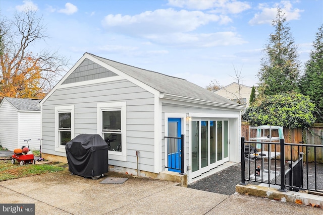 back of property with a patio area