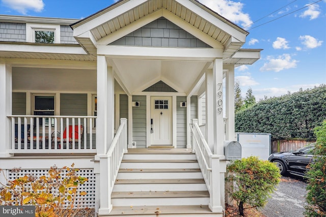 entrance to property with a porch