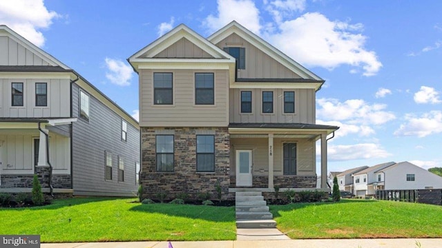 craftsman-style home with a porch and a front yard