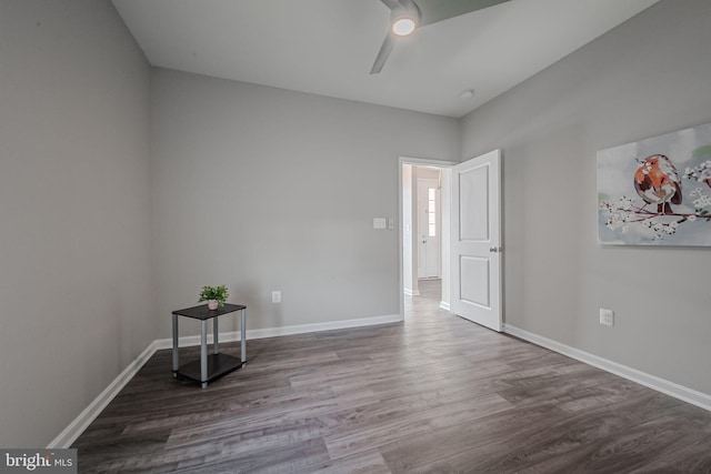 unfurnished room featuring ceiling fan and wood-type flooring