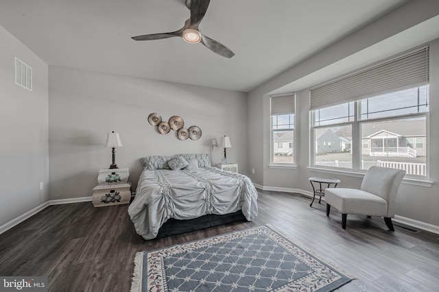 bedroom featuring hardwood / wood-style floors and ceiling fan