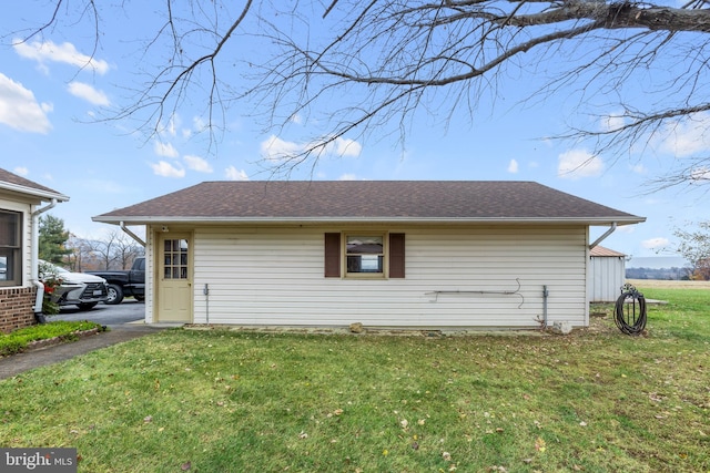 view of home's exterior featuring a lawn