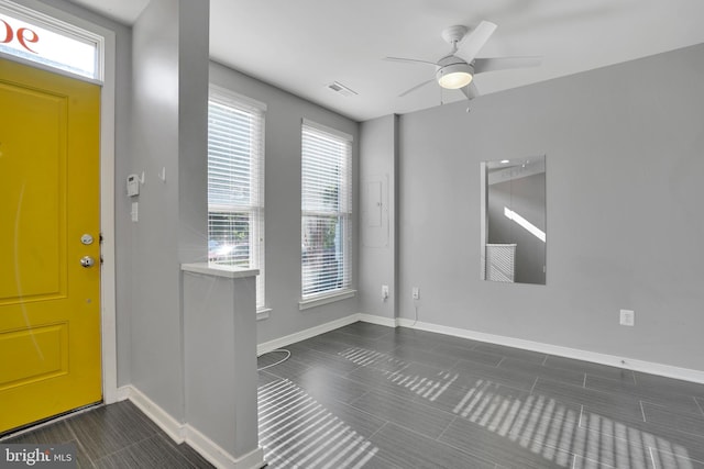 entrance foyer with ceiling fan and a healthy amount of sunlight