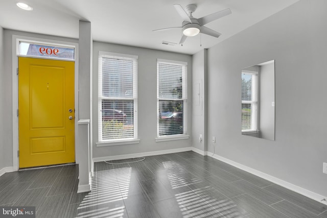 entrance foyer with ceiling fan