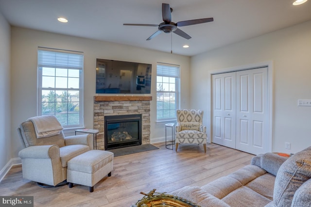 102 Serenity Cir, Middletown, DE 19709 - living room featuring hardwood / wood-style flooring, a ceiling fan, a fireplace, baseboards, and recessed lighting