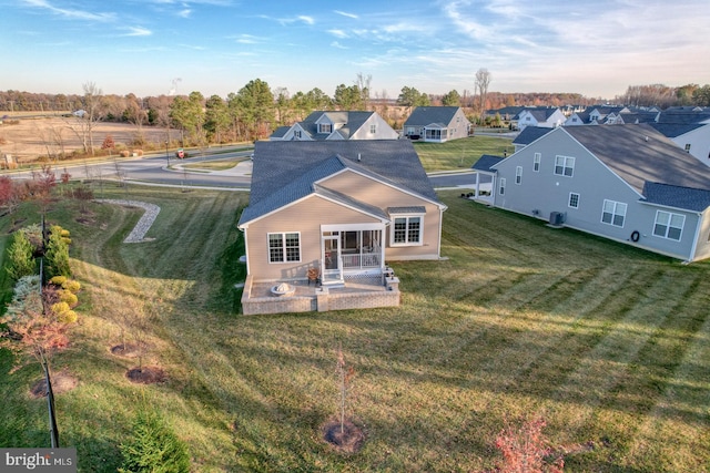 back of property with a patio area