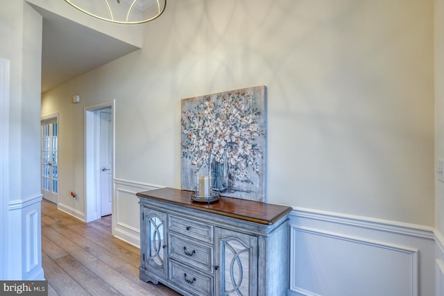 102 Serenity Cir, Middletown, DE 19709 - hall with wood-type flooring, a decorative wall, and a wainscoted wall
