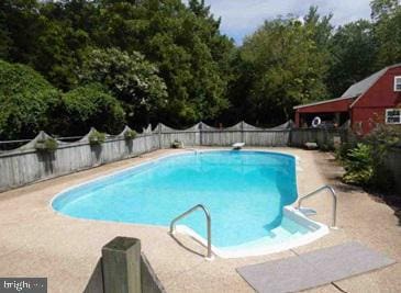 4555 Snow Hill Rd, Salisbury, MD 21804 - view of pool with a fenced backyard, a patio, and a diving board