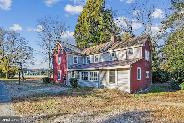 4555 Snow Hill Rd, Salisbury, MD 21804 - view of front of property with a chimney and metal roof