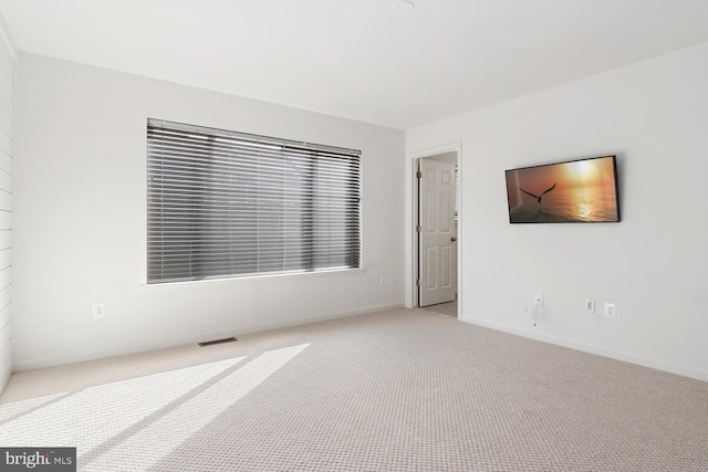 empty room with light carpet