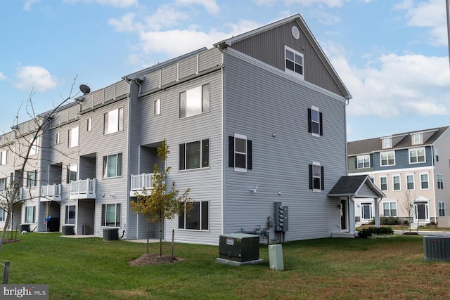 view of building exterior featuring central AC unit