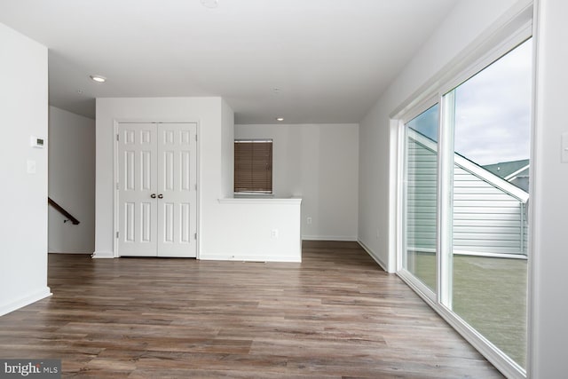 unfurnished room featuring wood-type flooring