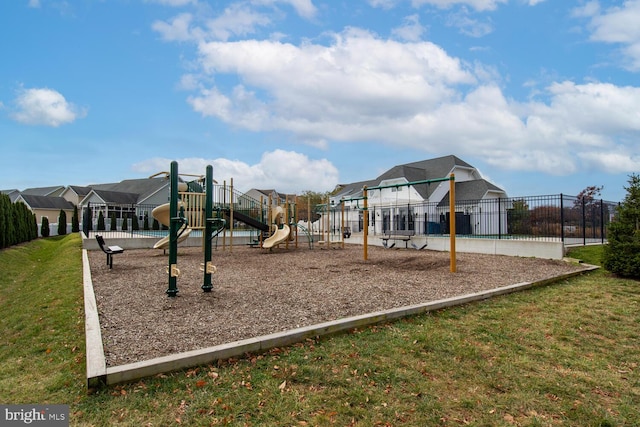 view of play area with a yard