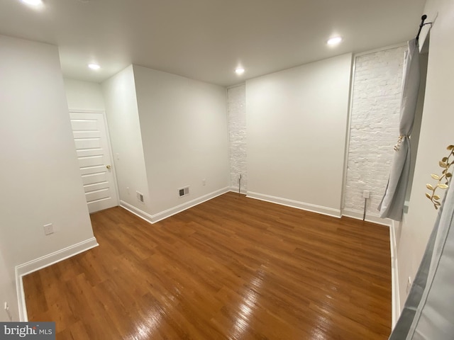 basement featuring dark wood-type flooring