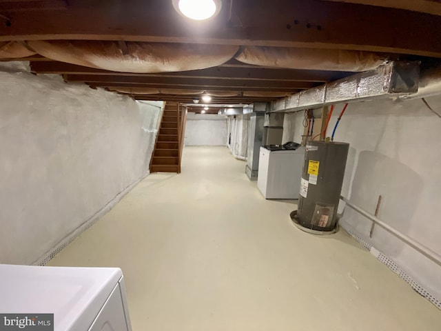 basement featuring washer / dryer and water heater