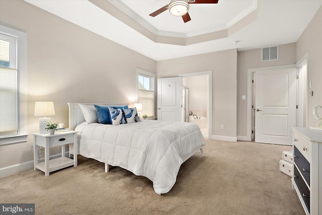 bedroom with light colored carpet, multiple windows, and ceiling fan