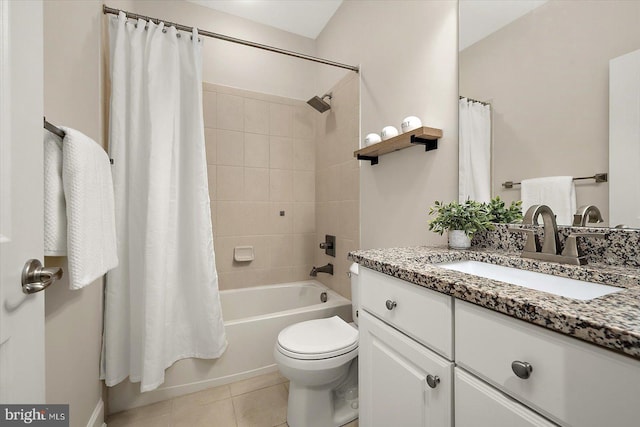 full bathroom with toilet, tile patterned floors, vanity, and shower / tub combo with curtain