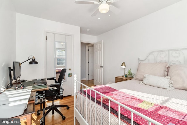 bedroom featuring ceiling fan and light hardwood / wood-style flooring