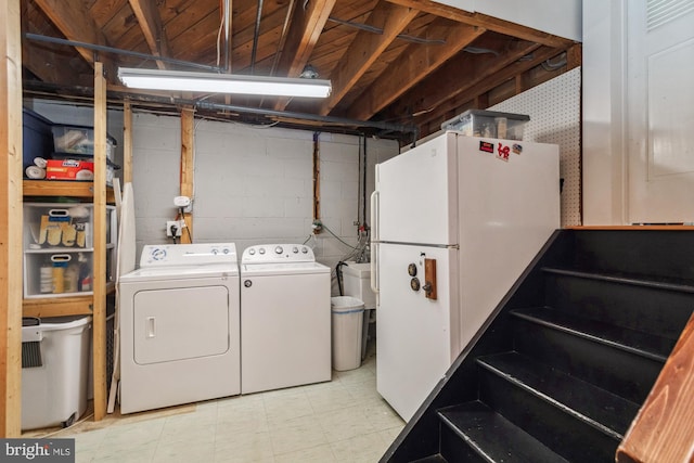 laundry room with washer and dryer