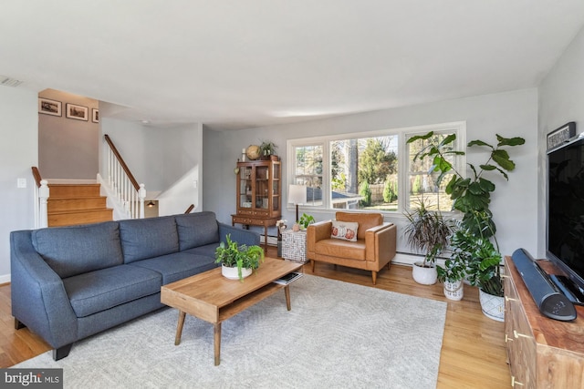 living room featuring light wood-type flooring