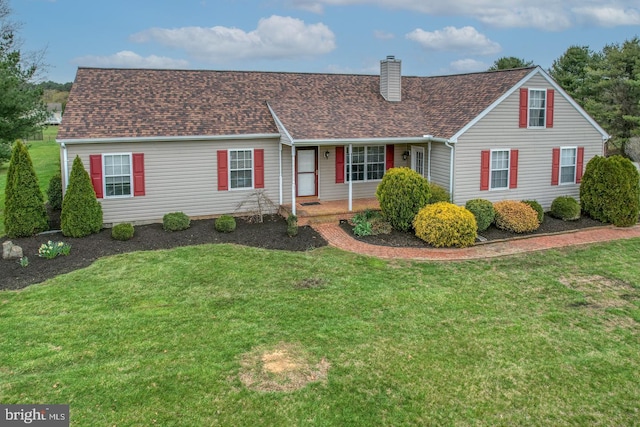 view of front facade with a front lawn