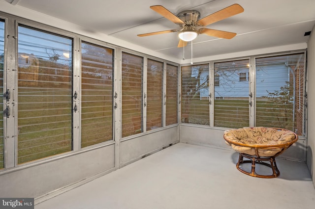 sunroom / solarium with ceiling fan