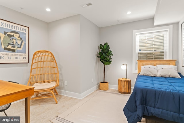 bedroom with light hardwood / wood-style flooring