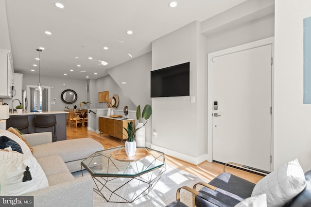 living room featuring light wood-type flooring