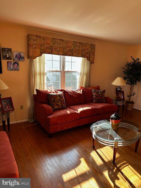 living room with hardwood / wood-style flooring