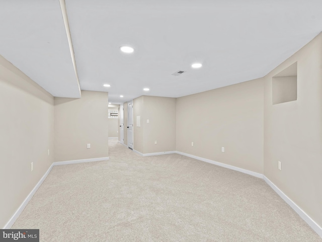 basement with light carpet