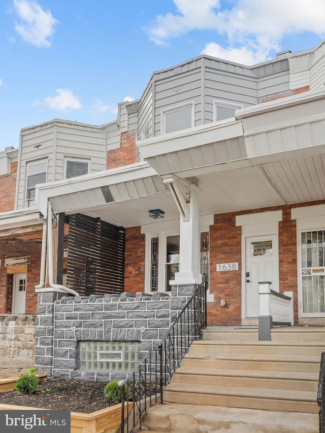 entrance to property with a porch