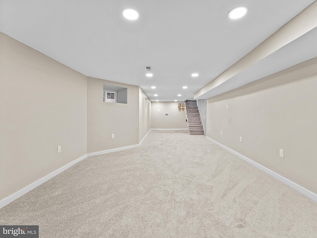 basement with light carpet