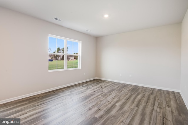 empty room featuring hardwood / wood-style floors