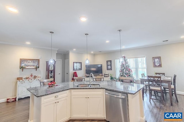 kitchen featuring stainless steel dishwasher, white cabinets, sink, and dark wood-type flooring