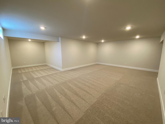 basement with carpet flooring