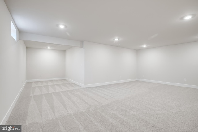 basement with light carpet