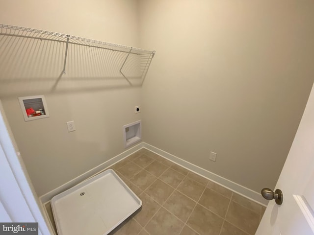 laundry room featuring hookup for an electric dryer, tile patterned flooring, and hookup for a washing machine