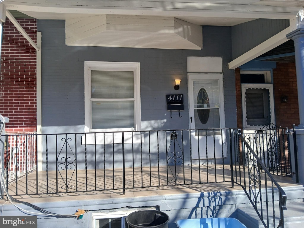 entrance to property with a porch