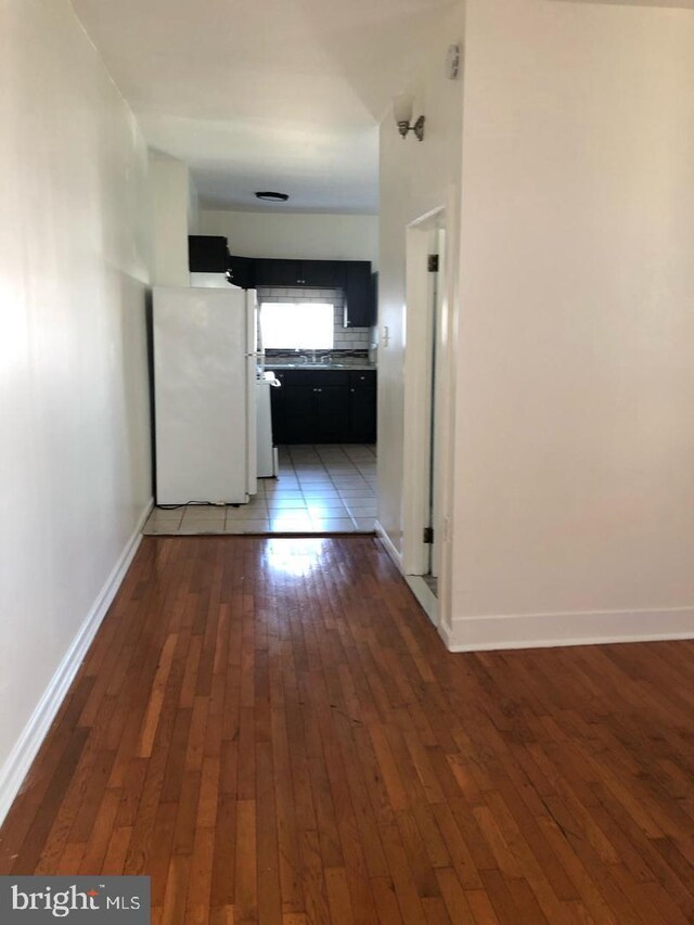 1600 S Taney St, Philadelphia, PA 19145 - hallway featuring hardwood / wood-style floors and baseboards