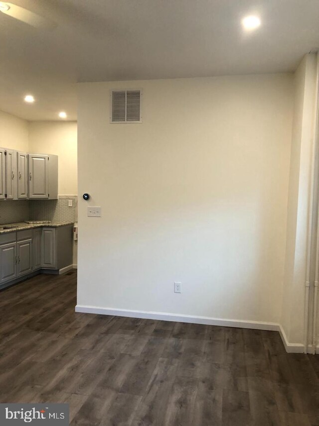 1600 S Taney St, Philadelphia, PA 19145 - unfurnished dining area with baseboards, recessed lighting, and dark wood-type flooring