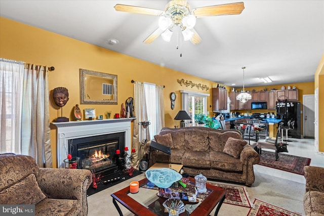 living room featuring ceiling fan