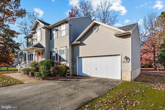 view of side of property featuring a garage